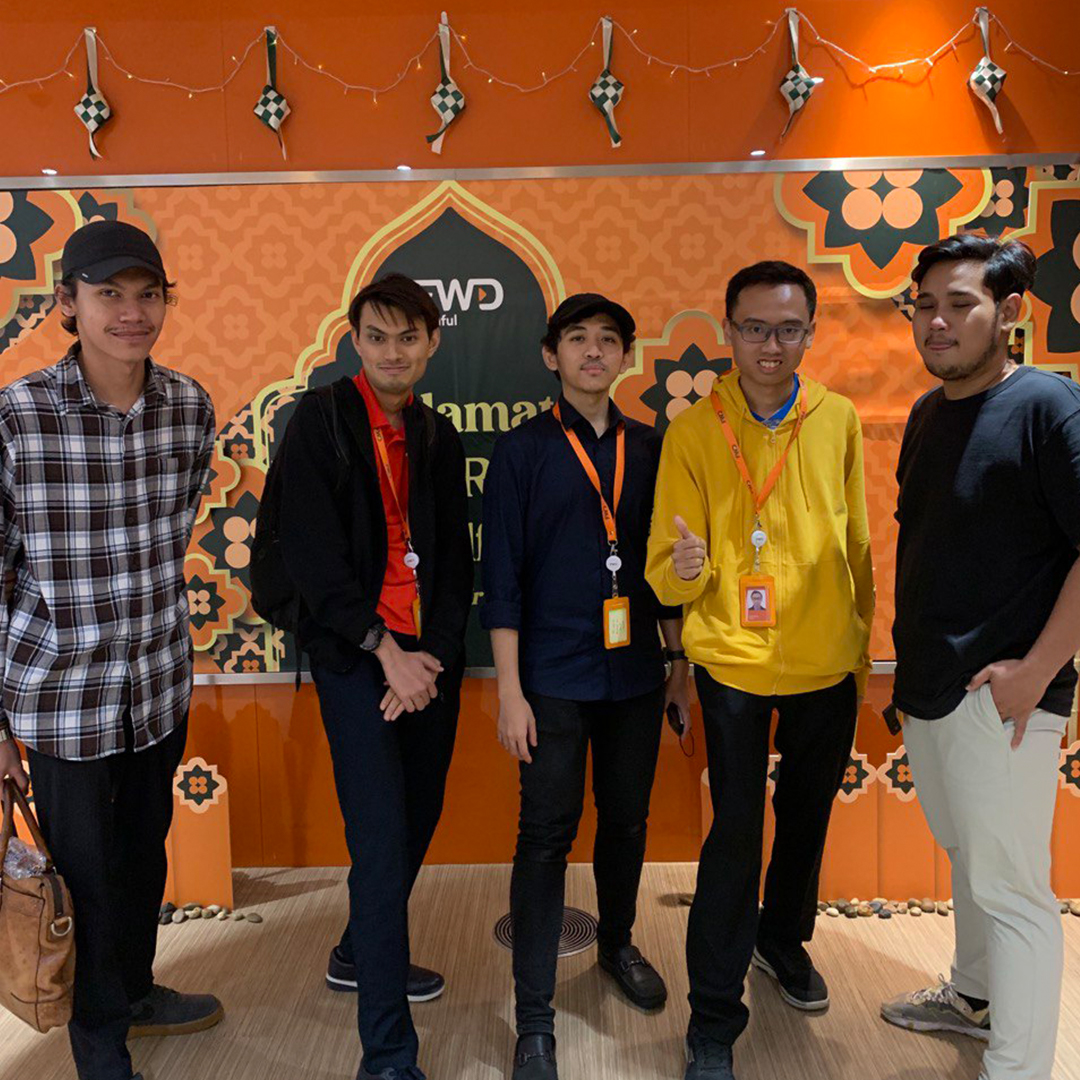 Photo of Alif and Colleague in FWD Building